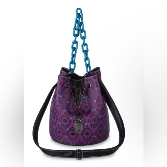Loungefly Handbags - NEW Disney Parks Loungefly Glow in the Dark Haunted Mansion Bucket Crossbody Bag